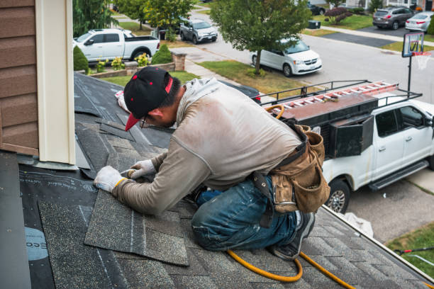 Professional Roofing technician working in East Springfield, OH